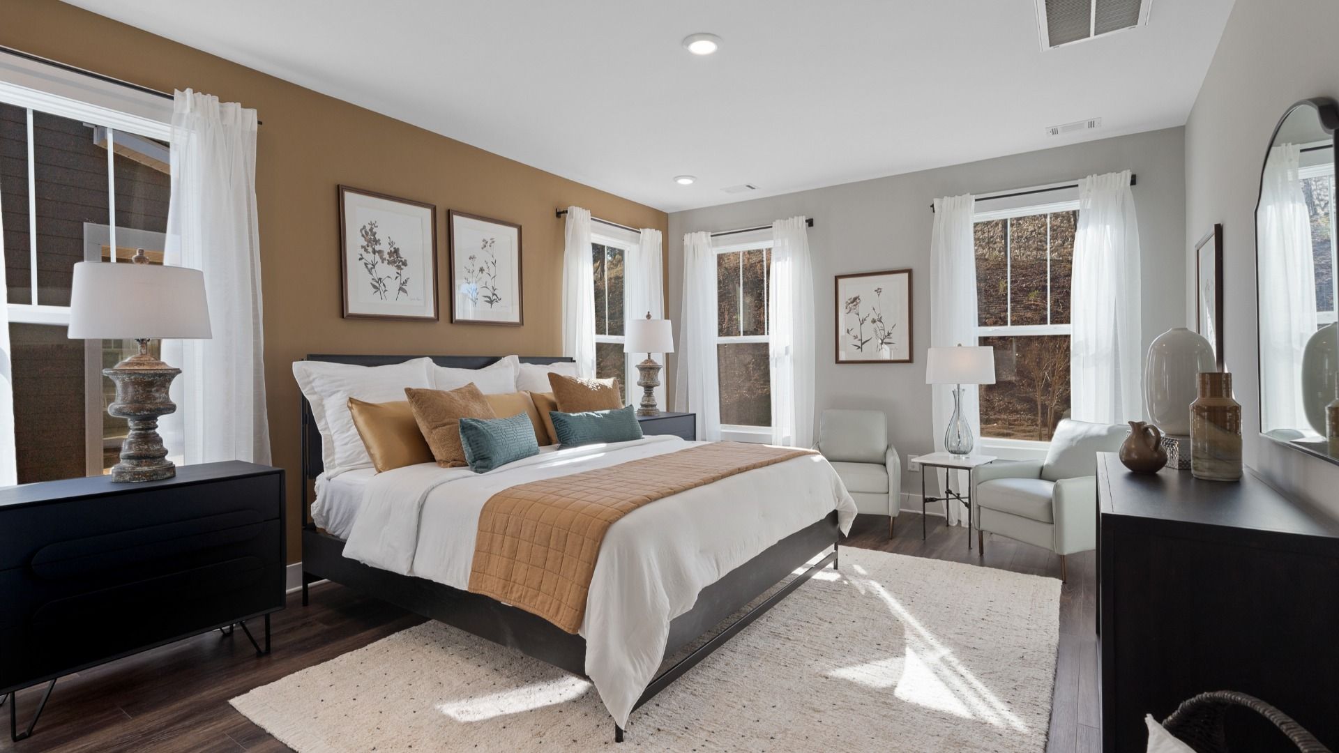 Memorable mornings begin in this tasteful and thoughtfully crafted primary suite at Harrier Point
