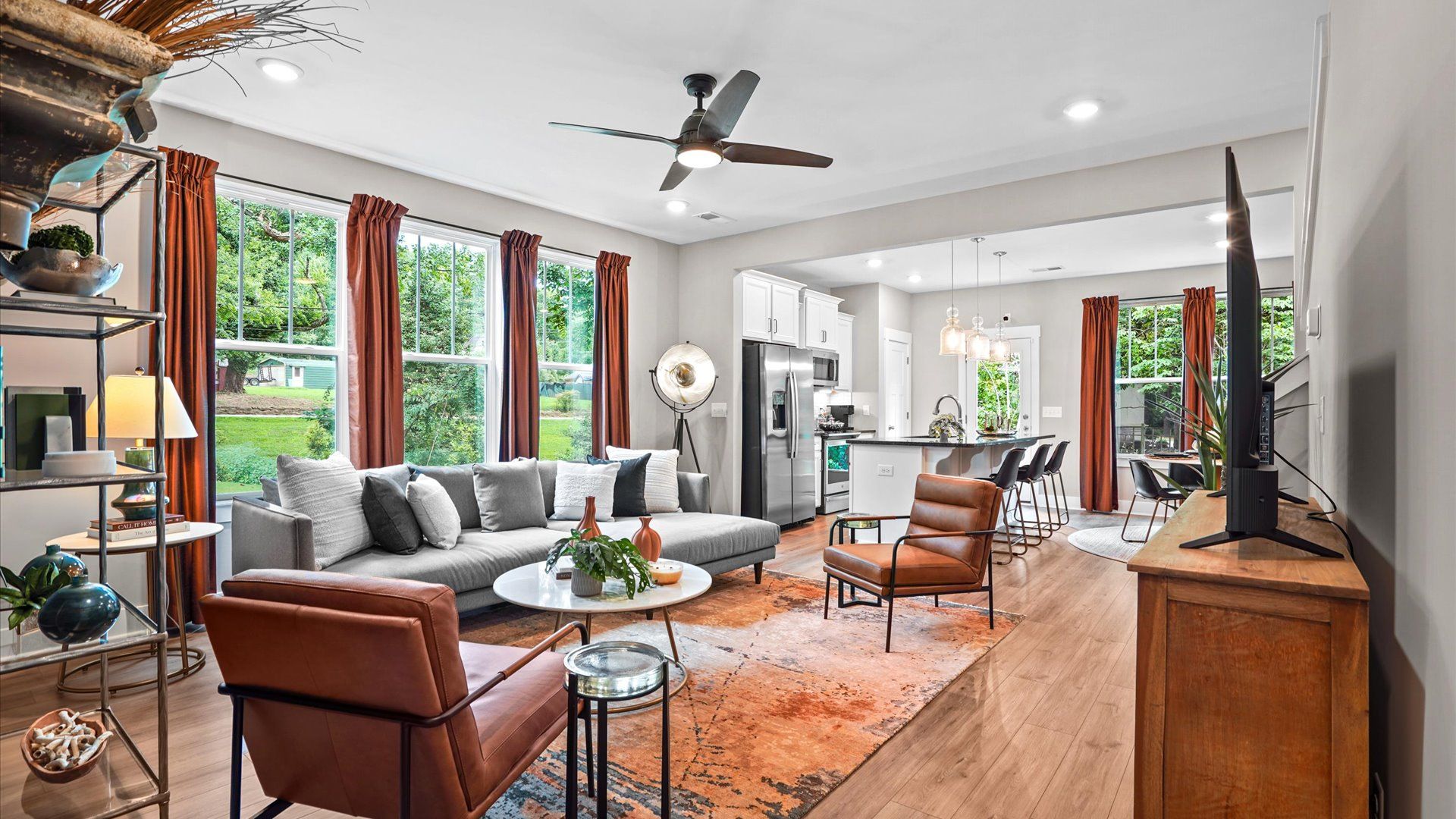 New two story townhome family room with modern decor at Clayton Crossing by DRB Homes in Arden, NC