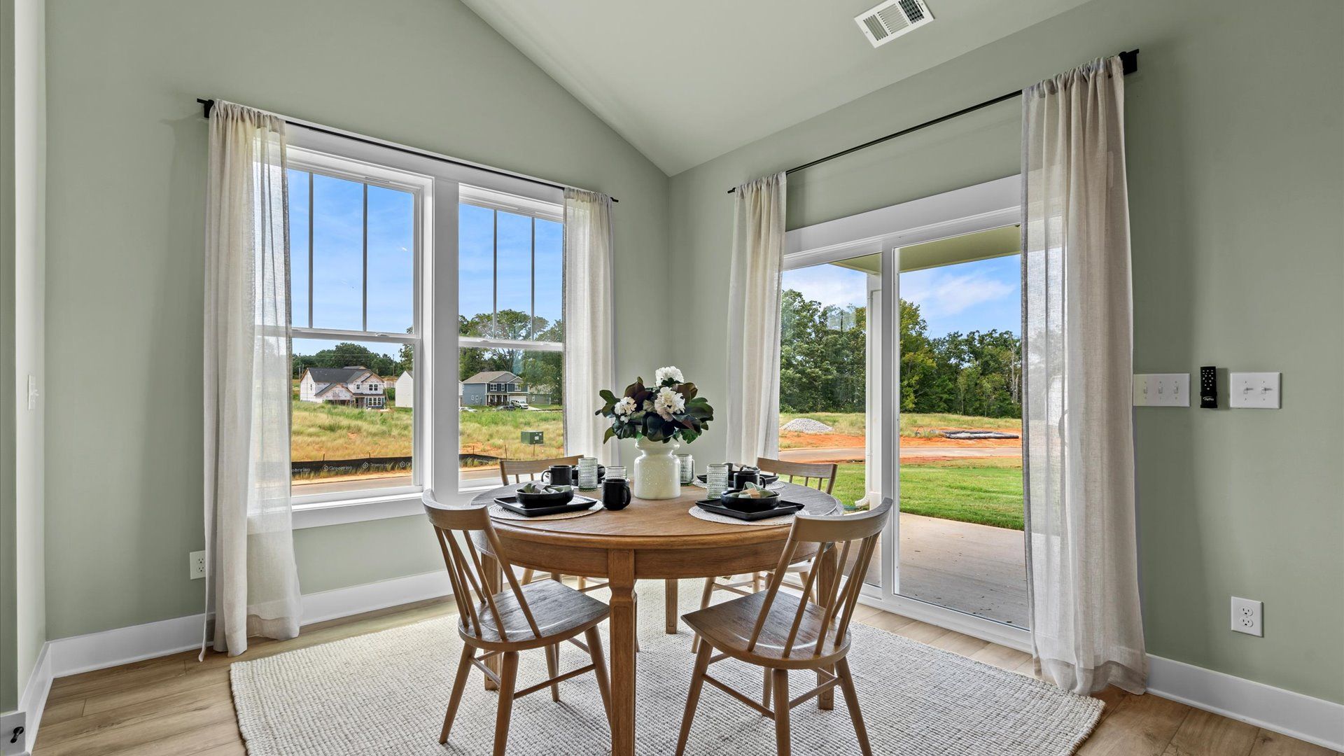 Open-concept breakfast area with thoughtful flow—perfect for entertaining in this first-class home