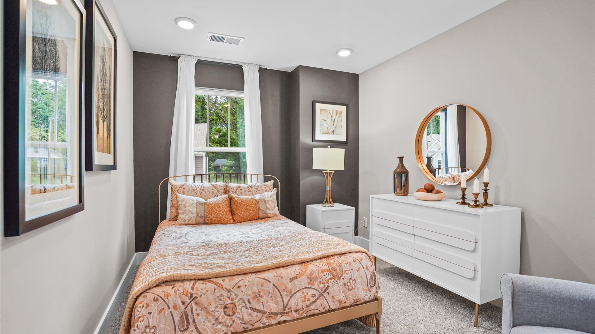 Plush carpeted office space with large windows in a two story townhome at Clayton Crossing in Arden, NC