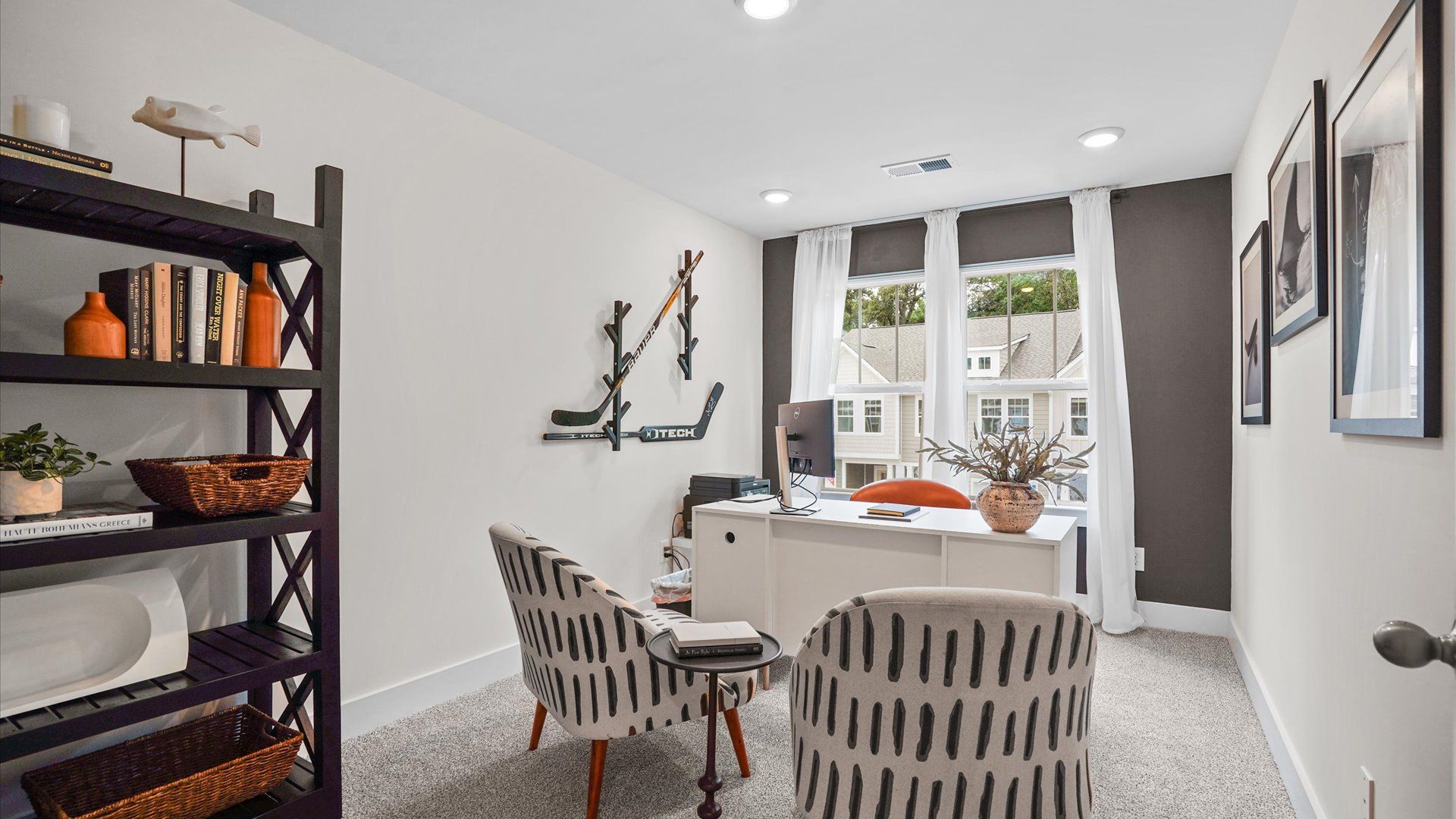 Plush carpeted, cozy secondary bedroom with large windows and elevated ceilings at Clayton Crossing by DRB Homes in Arden, NC