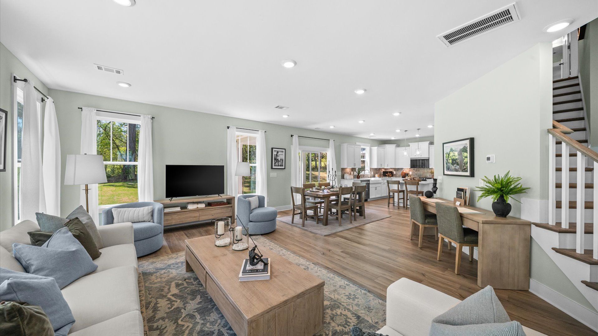 Exclusive living space with tasteful touches, natural light, and a vibrant open-concept feel