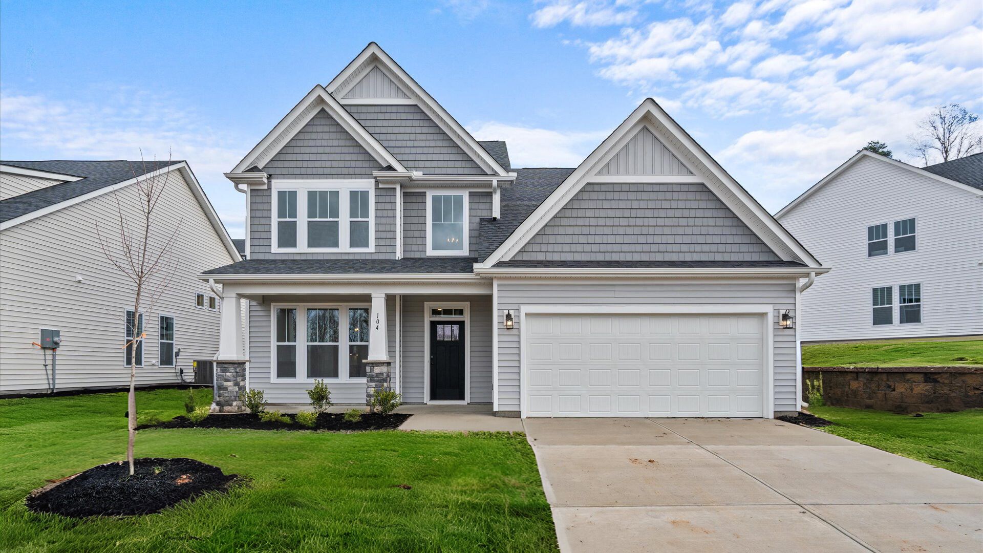Notable street presence with tasteful elevation and thoughtful landscaping