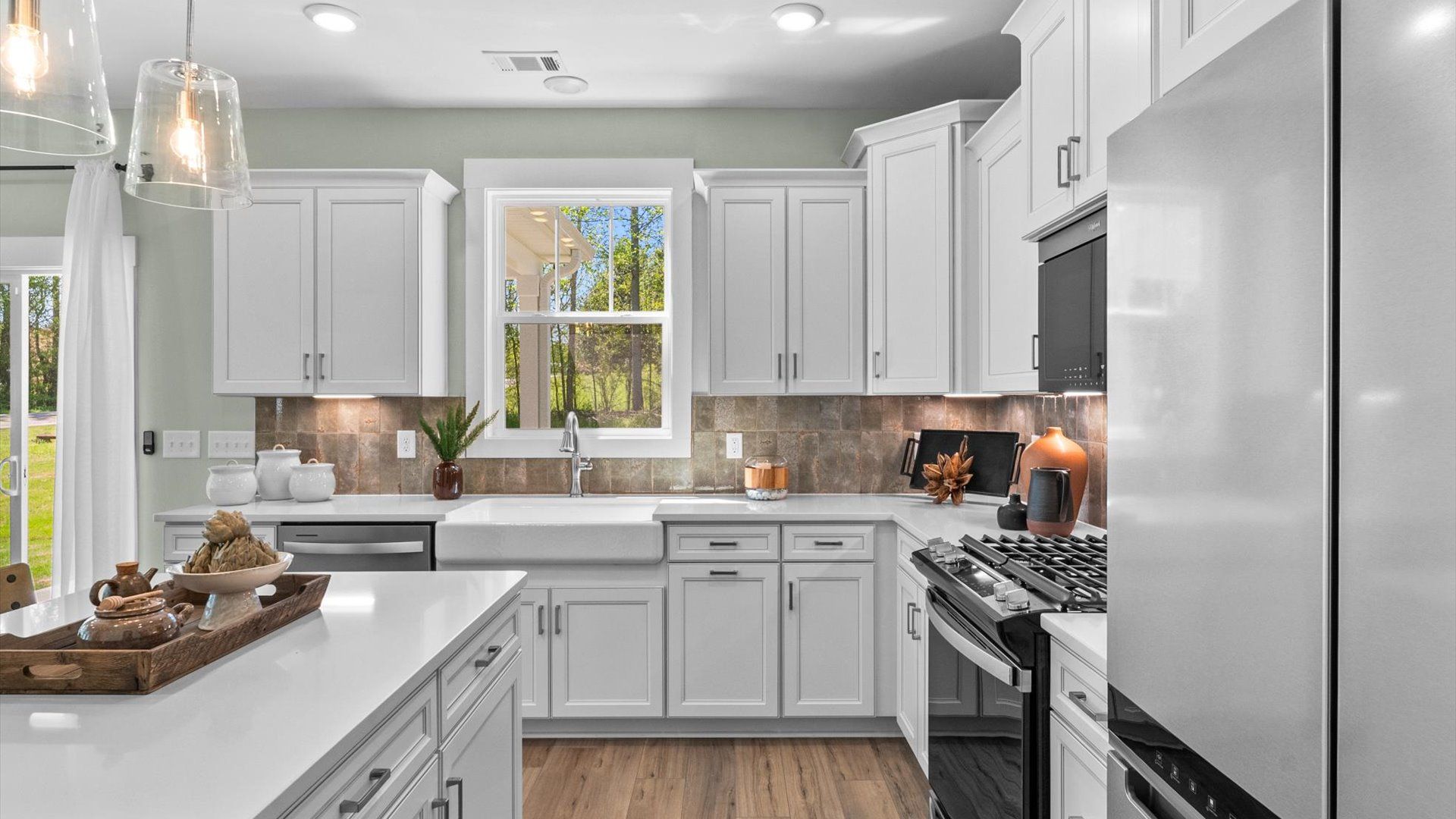Accomplished design in a kitchen that blends function and form with a right-sized island