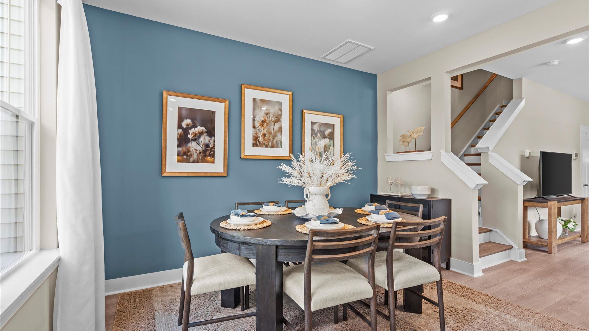Breakfast area with large windows in two story townhome at Ransdell Pointe by DRB Homes in Spartanburg, SC