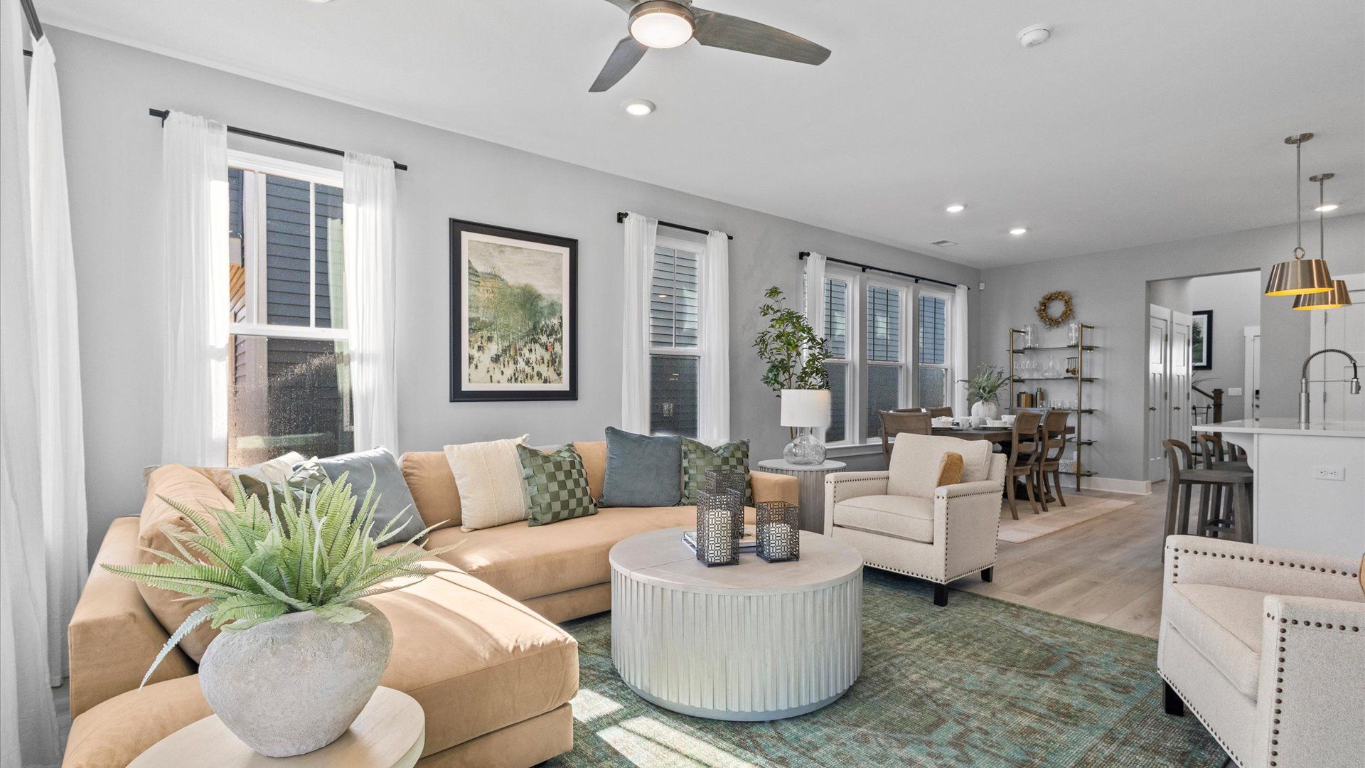 Mint home plan open concept living room, kitchen, breakfast area with natural light