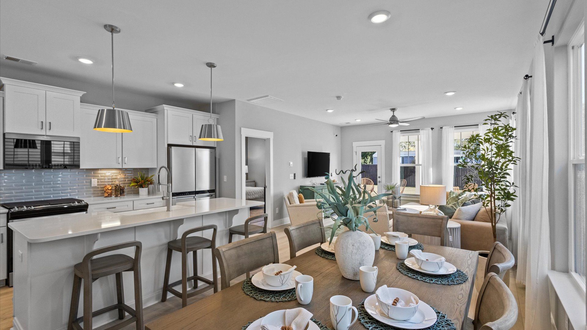 Mint home plan kitchen with center island and breakfast area