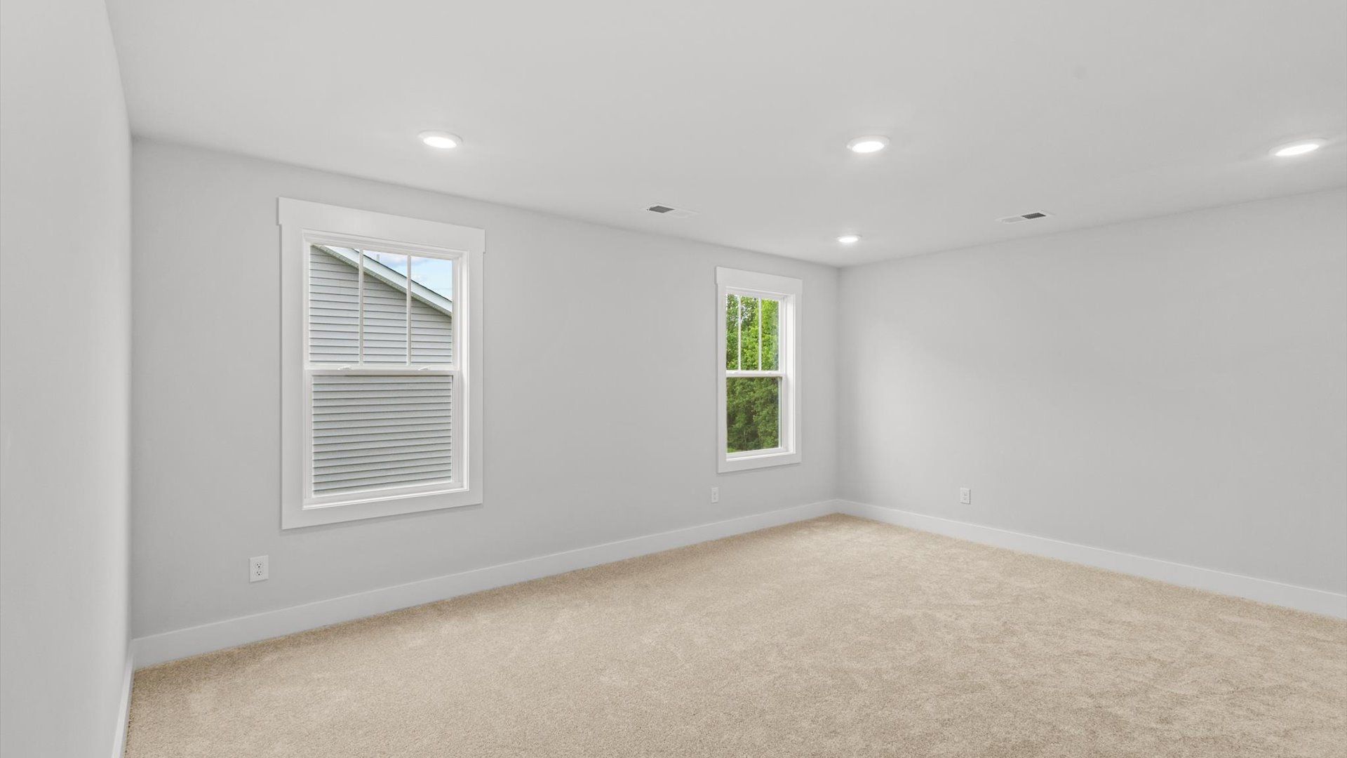 Neroli home plan oversized primary suite with windows, large closet and en suite bath