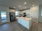 Amber Fields - Carriage Homes at Ashford por David Weekley Homes en Minneapolis-St. Paul Minnesota