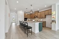 North River Ranch - Cottage Series por David Weekley Homes en Sarasota-Bradenton Florida