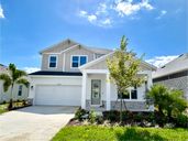 North River Ranch - Cottage Series por David Weekley Homes en Sarasota-Bradenton Florida