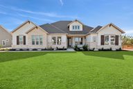 Megan's Landing - Half-Acre Homesites por David Weekley Homes en San Antonio Texas