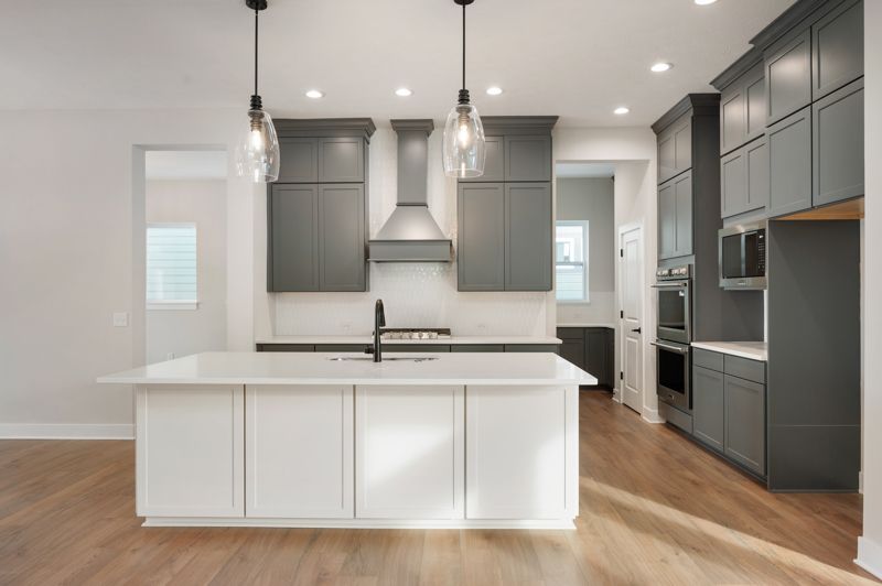 Chatham Village - The Cottage Collection por David Weekley Homes en Indianapolis Indiana