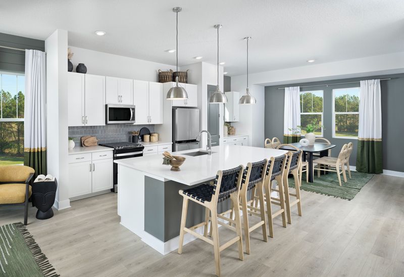 Apex at Seminole Heights por David Weekley Homes en Tampa-St. Petersburg Florida