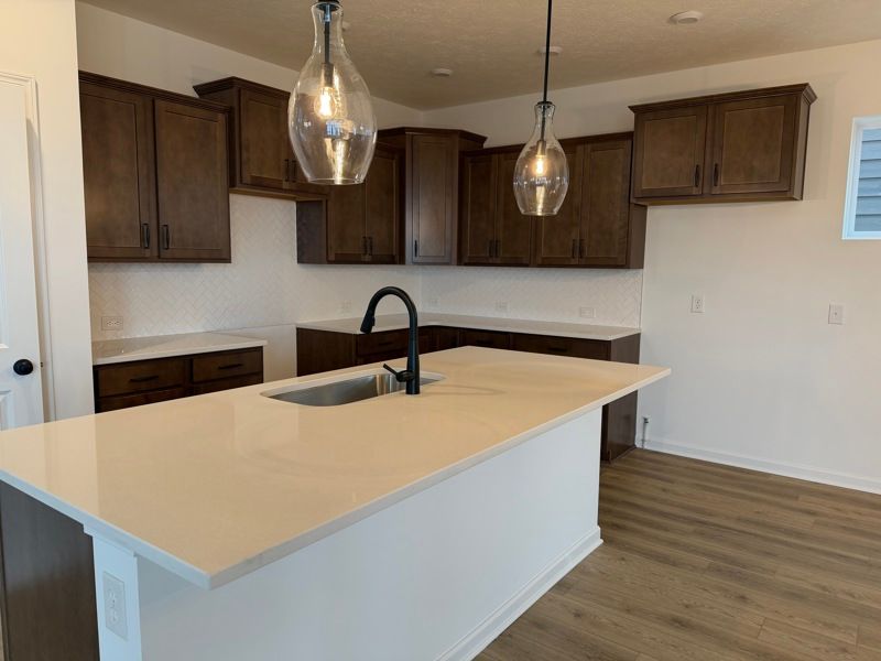 Harvest Trail of Westfield – The Courtyard Collection por David Weekley Homes en Indianapolis Indiana