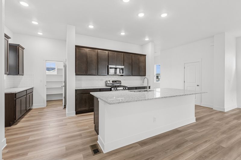 Painted Prairie Cottage por David Weekley Homes en Denver Colorado