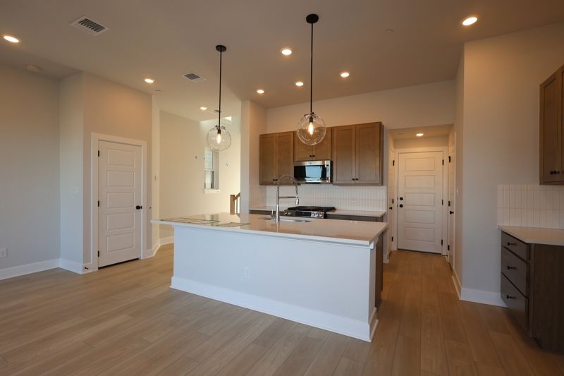 Double Creek Crossing por David Weekley Homes en Austin Texas