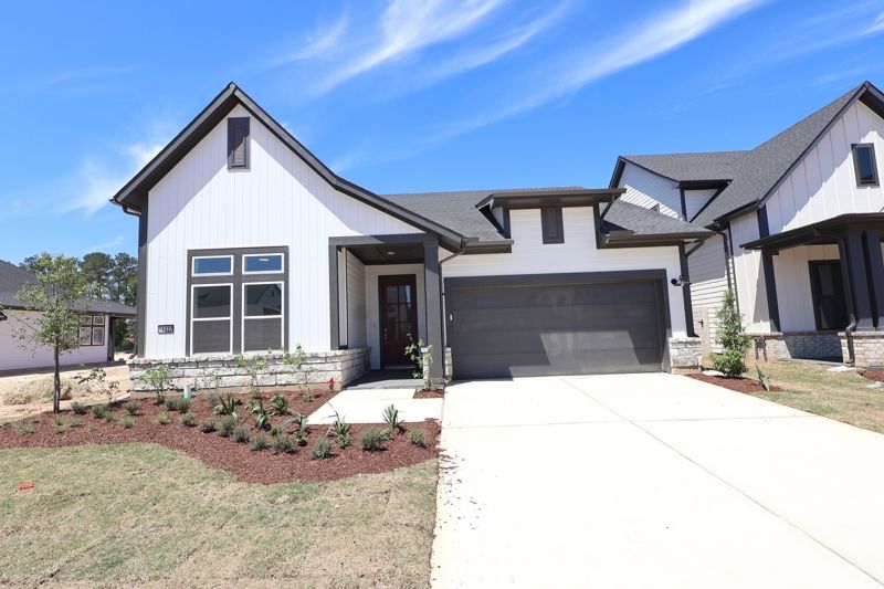 Two Step Farm 50' por David Weekley Homes en Houston Texas