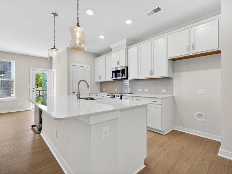 Central Living at Craig por David Weekley Homes en Charlotte North Carolina
