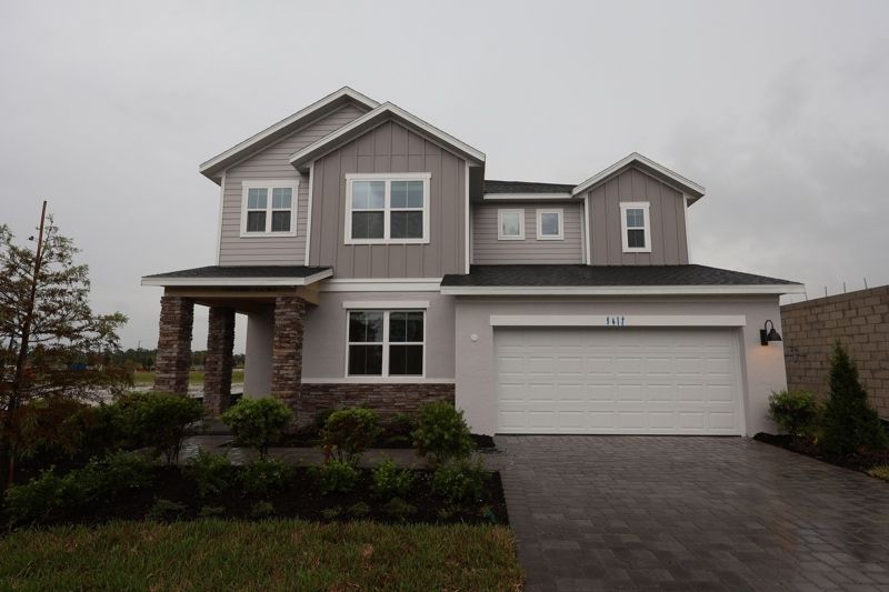 Palmeras at Crossprairie - The Grove Collection por David Weekley Homes en Orlando Florida