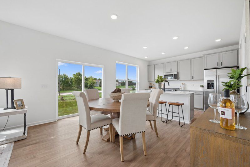 Summerland Place - The Tradition Collection por David Weekley Homes en Minneapolis-St. Paul Minnesota
