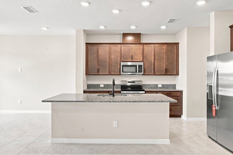 Palmeras at Crossprairie - The Palms Collection por David Weekley Homes en Orlando Florida