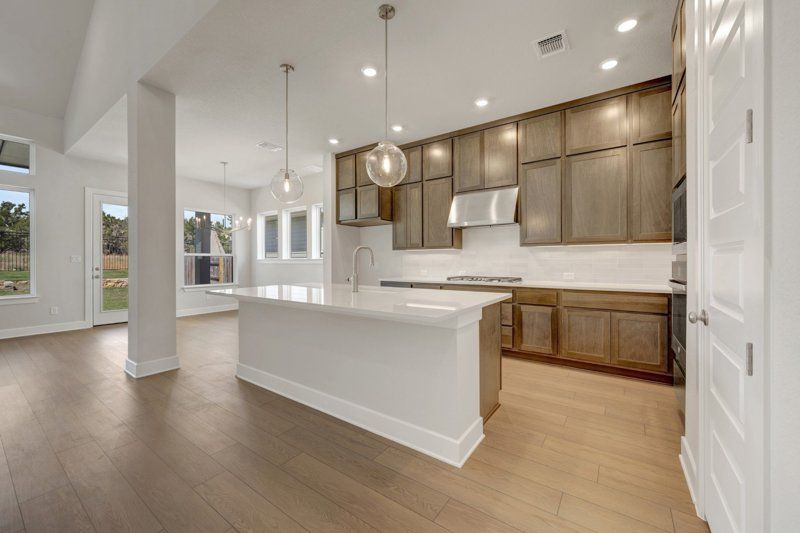 Headwaters 50' - Executive Series por David Weekley Homes en Austin Texas