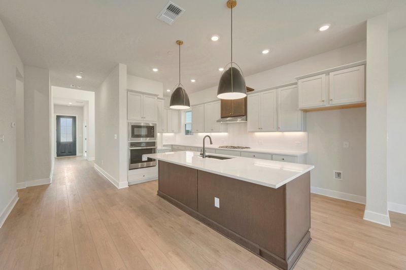 Double Creek Crossing por David Weekley Homes en Austin Texas