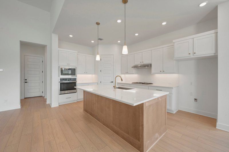 Headwaters 50' - Executive Series por David Weekley Homes en Austin Texas