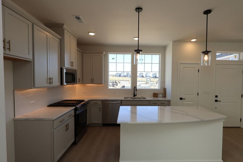 Revel Crossing at Wolf Ranch - The Ascent Collection por David Weekley Homes en Colorado Springs Colorado