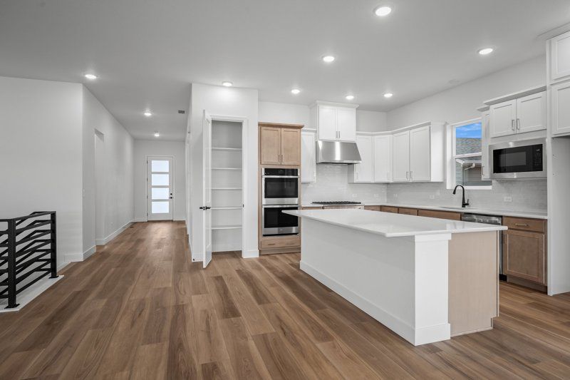 Wolf Ranch - Enclave Collection por David Weekley Homes en Colorado Springs Colorado