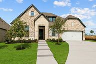 Redden Farms - Executive Series por David Weekley Homes en Dallas Texas