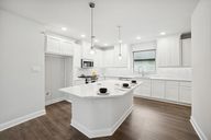 Creekshaw – Gardens por David Weekley Homes en Dallas Texas