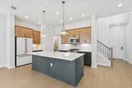 Village on Cooper Lane 22' por David Weekley Homes en Austin Texas