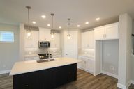 Painted Tree Woodland West - Cottages por David Weekley Homes en Dallas Texas