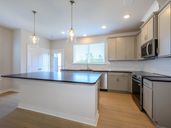 Central Living at Craig por David Weekley Homes en Charlotte North Carolina