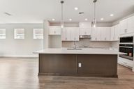 North River Ranch - Cottage Series por David Weekley Homes en Sarasota-Bradenton Florida