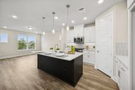 Painted Tree Woodland West - Cottages por David Weekley Homes en Dallas Texas