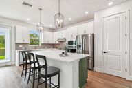 Persimmon Park - Garden Series por David Weekley Homes en Tampa-St. Petersburg Florida