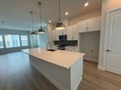 Apex at Seminole Heights por David Weekley Homes en Tampa-St. Petersburg Florida