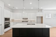 Dunham Pointe 50' Homesites por David Weekley Homes en Houston Texas