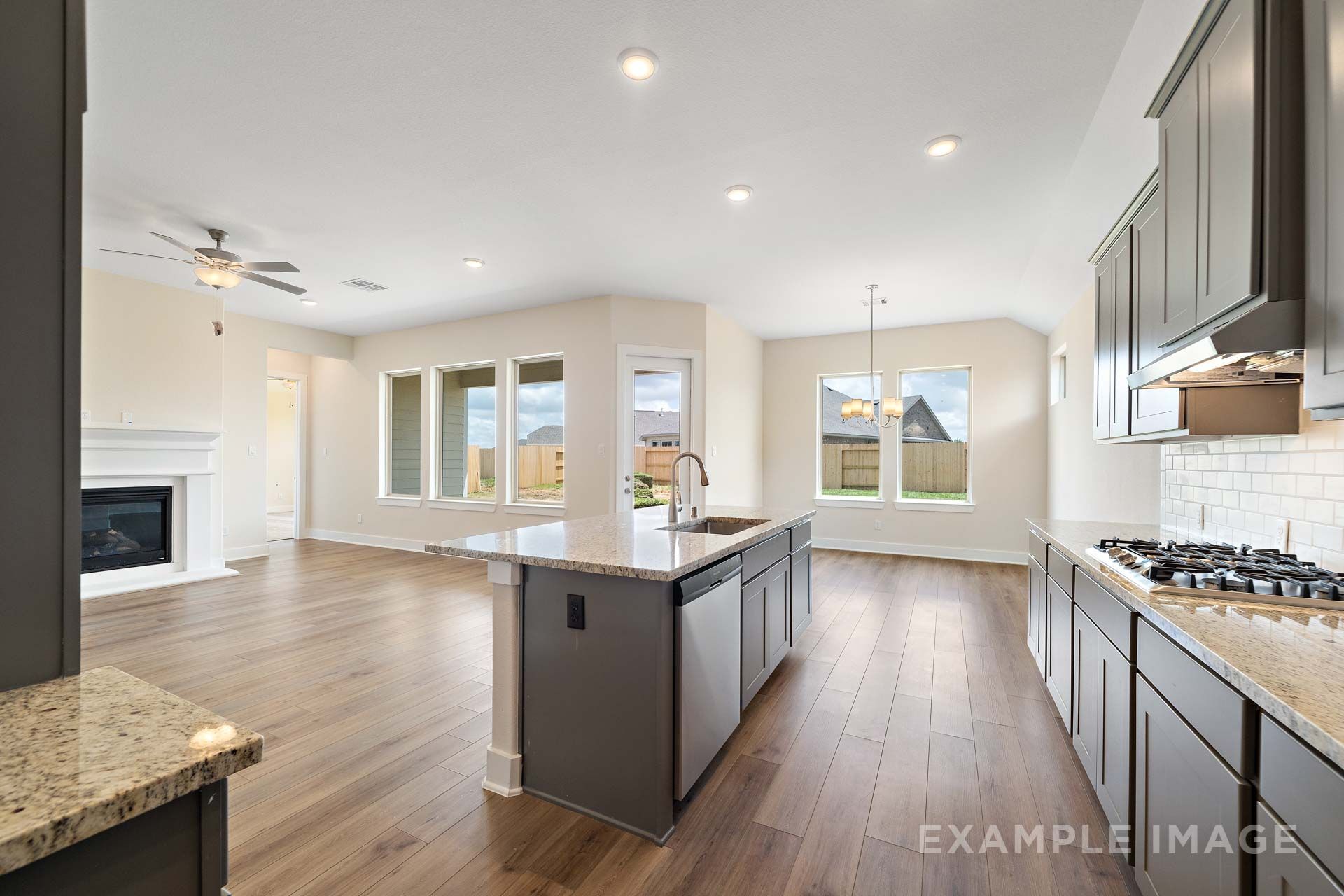 Kitchen, Dining, and Family Room of the Diana Floor Plan