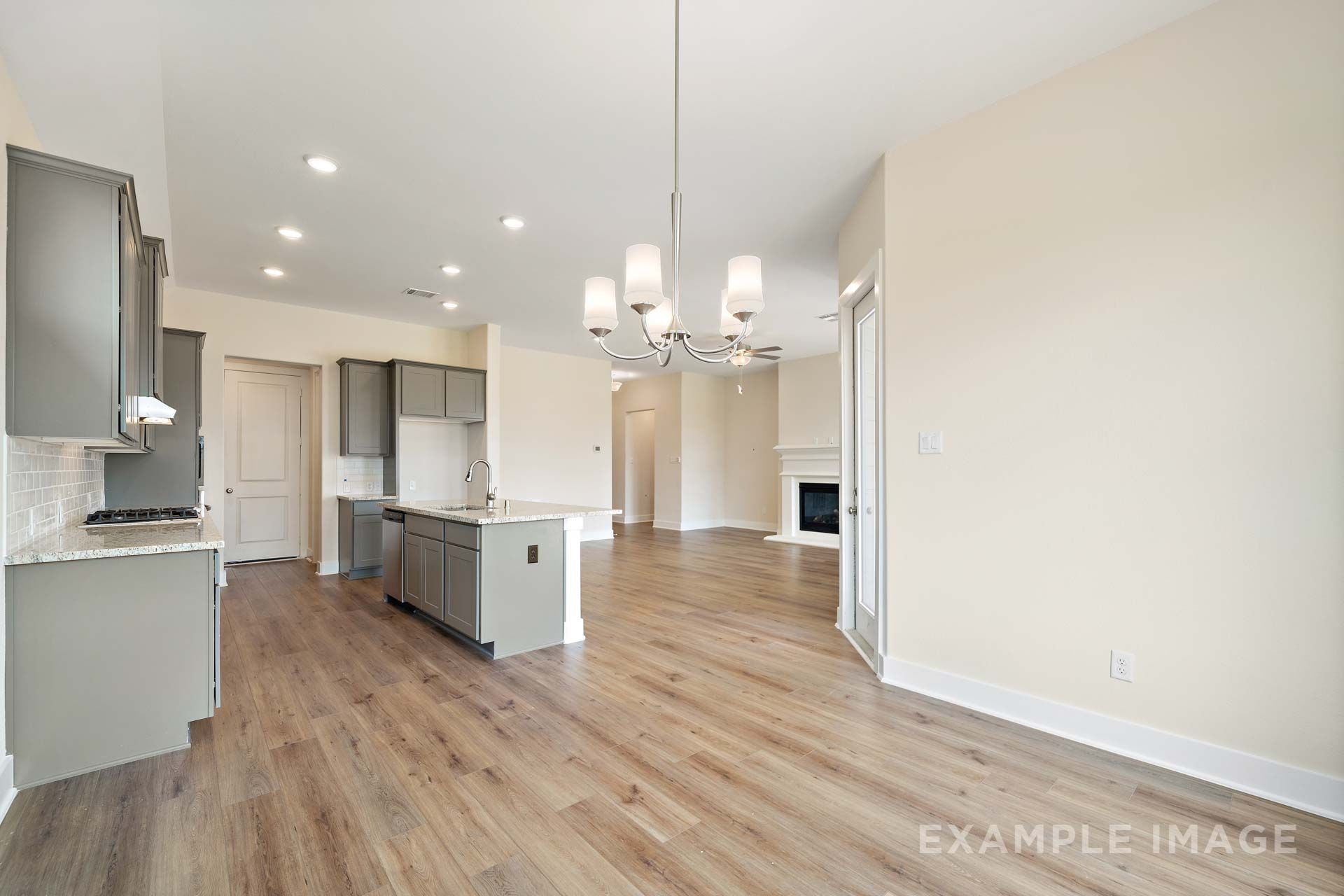 Kitchen, Dining, and Family Room of the Diana Floor Plan