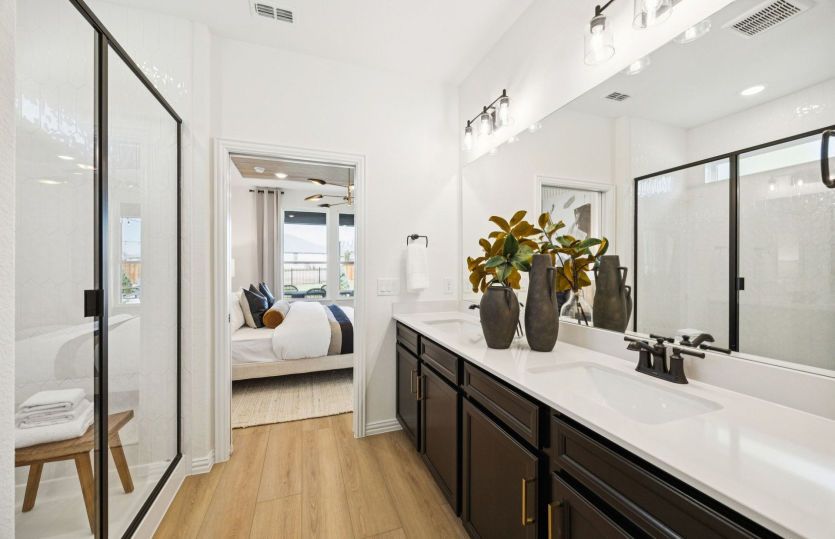 Owner's bath with double vanity and large shower