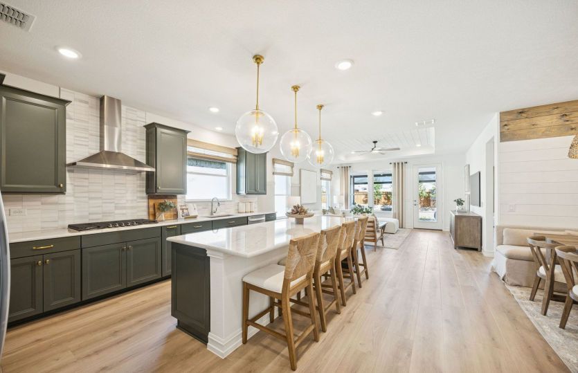 Eat-in island kitchen with pendant lighting