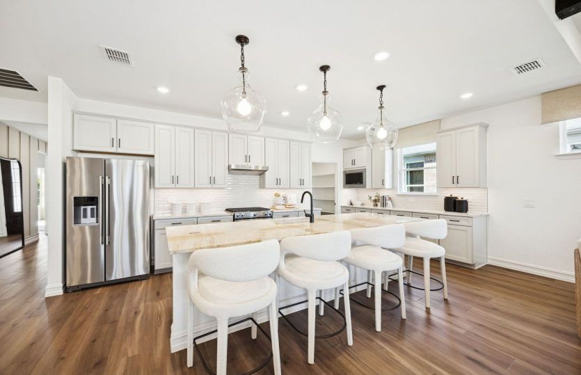 Gorgeous open-concept kitchen with abundant cabinet space