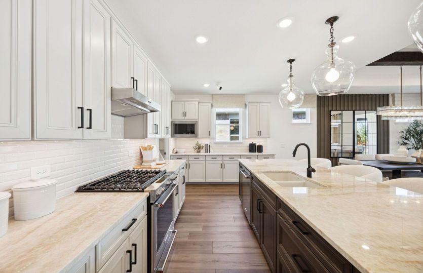 Recessed and pendant lighting in kitchen