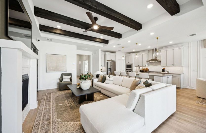Open concept living area with optional beams