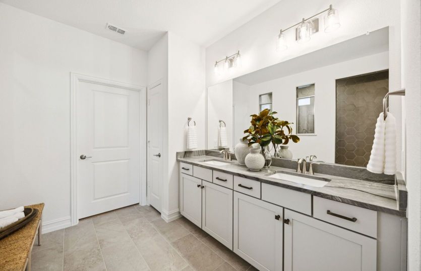Spacious owner's suite with double vanity