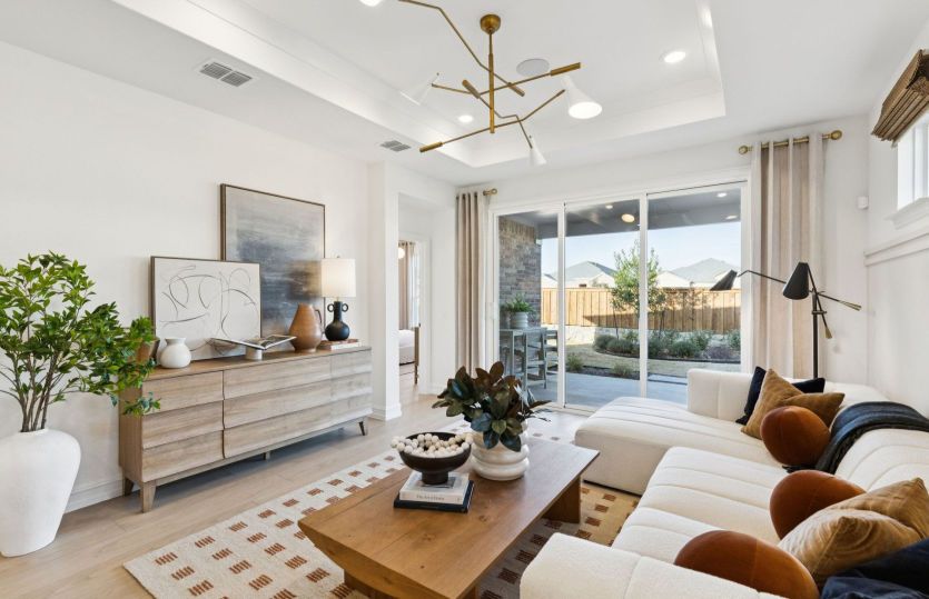 Spacious gathering room with optional sliding glass doors
